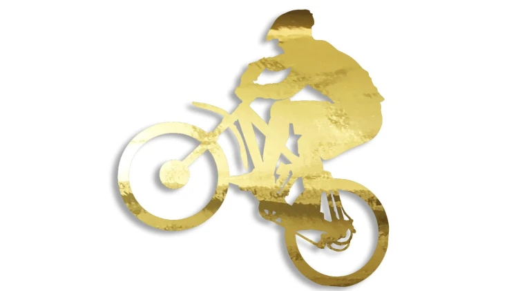 Naklejka rowerowa na szybę i karoserię - rowerzysta skaczący na rowerze złoty chrom